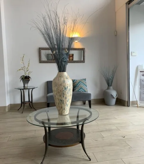 Clinic waiting area with decorative vase